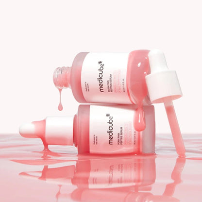 Texture légère et rosée du MEDICUBE Pink Peptide Glow Serum qui pénètre rapidement dans la peau.